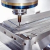 What is heat treatment and how does it improve CNC-machined parts?