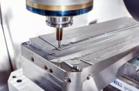 What is heat treatment and how does it improve CNC-machined parts?